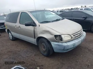 2001 Toyota Sienna CE with VIN 4T3ZF19C51U329489, listed as a IAAI auction lot 41535721 with 218,839 mi miles. Bid and sale history available at carsss.com. Image 1.