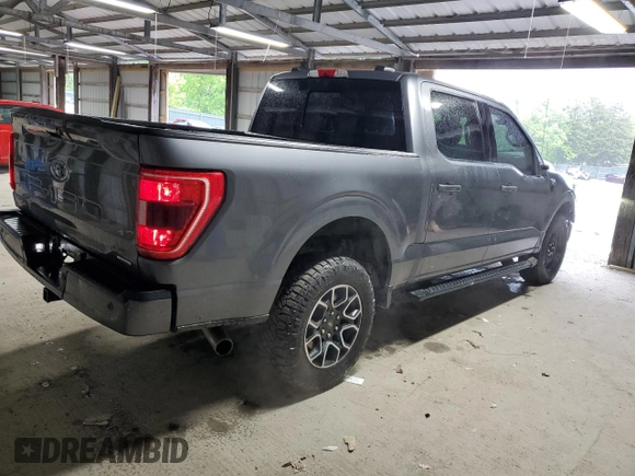 2021 Ford F-150 XL with VIN 1FTFW1E82MFA21318, listed as a Copart auction lot 54409795 with 74,977 mi miles and Salvage Title. Bid and sale history available at carsss.com. Image 3.