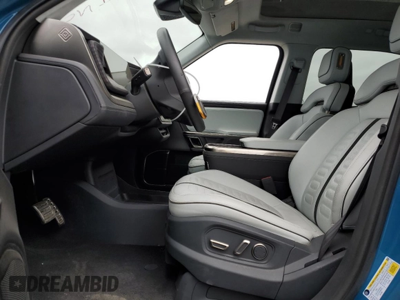 2023 Rivian R1T Launch Edition with VIN 7FCTGAAL7PN019188, listed as a Copart auction lot 55100405 with 13,654 mi miles and Salvage Title. Bid and sale history available at DreamBid. Image 7.