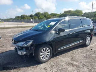 2019 Chrysler Pacifica Touring L with VIN 2C4RC1BG7KR627074, listed as a IAAI auction lot 41930694 with 69,210 mi miles. Bid and sale history available at carsss.com. Image 2.