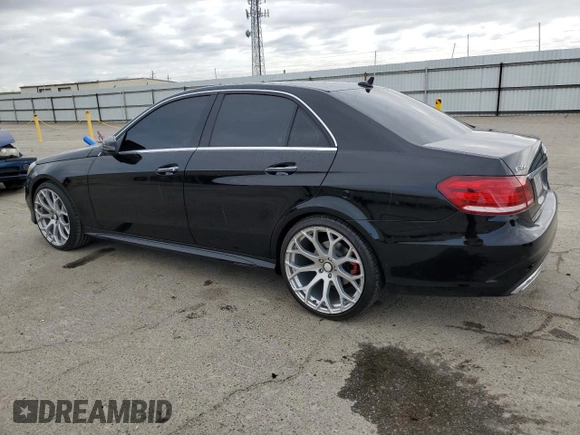 2015 Mercedes-Benz E 350 Sport with VIN WDDHF5KB5FB083344, listed as a Copart auction lot 51479885 with 159,283 mi miles and Salvage title. Bid and sale history available at DreamBid. Image 2.