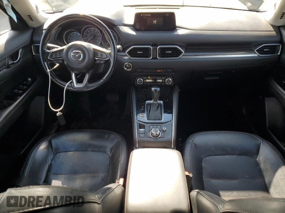 2018 Mazda CX-5 Grand Touring with VIN JM3KFADM5J0325794, listed as a Copart auction lot 79748544 with 106,781 mi miles and Salvage Title. Bid and sale history available at carsss.com. Image 8.
