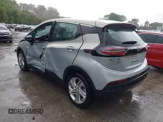 2023 Chevrolet Bolt EV 1LT with VIN 1G1FW6S03P4140824, listed as a IAAI auction lot 42383006 with 23,942 mi miles and . Bid and sale history available at DreamBid. Image 3.