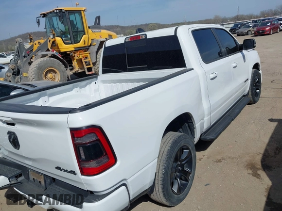 2021 Ram 1500 Big Horn with VIN 1C6SRFFT0MN521027, listed as a IAAI auction lot 41830596 with 55,013 mi miles and . Bid and sale history available at DreamBid. Image 4.