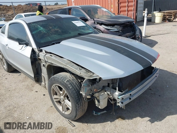 2012 Ford Mustang Premium with VIN 1ZVBP8AM5C5234532, listed as a IAAI auction lot 41860791 with 106,929 mi miles and . Bid and sale history available at DreamBid. Image 6.