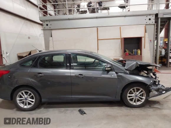 2017 Ford Focus SE with VIN 1FADP3F28HL314308, listed as a IAAI auction lot 42175299 with 74,917 mi miles and . Bid and sale history available at DreamBid. Image 13.