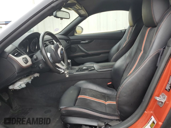 2016 BMW Z4 sDrive28i with VIN WBALL5C56GJ997841, listed as a Copart auction lot 80018144 with 0 mi miles and Salvage Title. Bid and sale history available at carsss.com. Image 7.