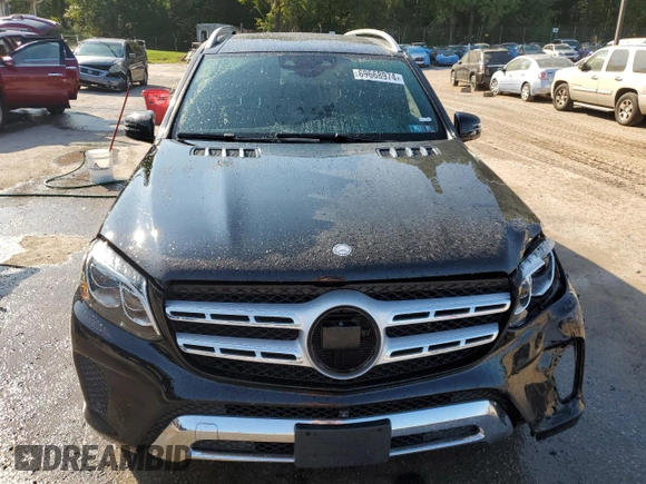 2017 Mercedes-Benz GLS 450 with VIN 4JGDF6EE9HA874694, listed as a Copart auction lot 69668974 with 128,694 mi miles and Salvage Title. Bid and sale history available at DreamBid. Image 5.