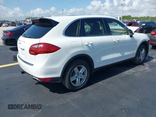 2014 Porsche Cayenne with VIN WP1AA2A20ELA02638, listed as a IAAI auction lot 42349570 with 113,355 mi miles and . Bid and sale history available at DreamBid. Image 4.