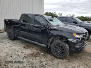 2023 Chevrolet Silverado 1500 LT Trail Boss with VIN 3GCPDFEK7PG106497, listed as a Copart auction lot 75603264 with 28,970 mi miles and Salvage Title. Bid and sale history available at DreamBid. Image 4.
