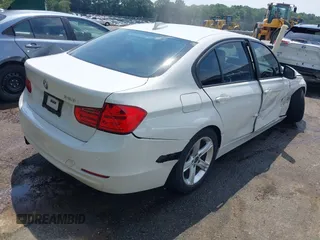 2014 BMW 3 Series 328i with VIN WBA3C1C5XEK107826, listed as a IAAI auction lot 42481701 with 104,151 mi miles and . Bid and sale history available at DreamBid. Image 4.