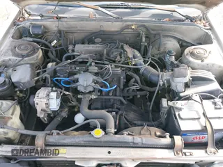1985 Toyota Camry z VIN JT2SV16E9F0351378, wystawiony jako IAAI lot #41605627 z przebiegiem 192 476 mil mil oraz . Historia ofert i sprzedaży dostępna na DreamBid. Obrazek 10.