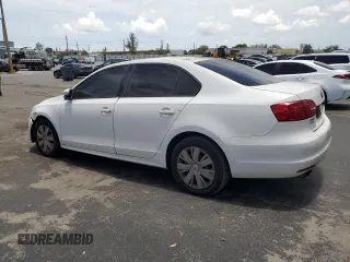 2014 Volkswagen Jetta SE with VIN 3VWD17AJ9EM366958, listed as a Copart auction lot 62948535 with 120,078 mi miles and Clean title. Bid and sale history available at DreamBid. Image 2.