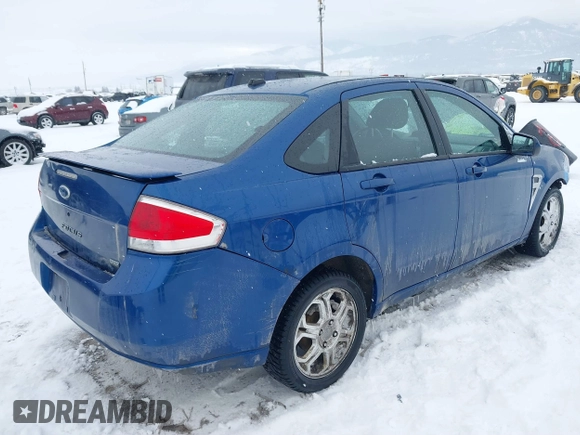 2008 Ford Focus SE with VIN 1FAHP35N58W185875, listed as a IAAI auction lot 41569411 with 185,579 mi miles. Bid and sale history available at carsss.com. Image 4.