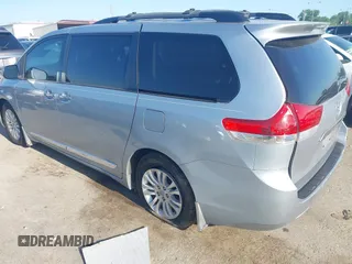 2014 Toyota Sienna XLE with VIN 5TDYK3DC8ES423450, listed as a IAAI auction lot 41972128 with 145,374 mi miles. Bid and sale history available at carsss.com. Image 3.
