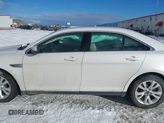 2011 Ford Taurus SEL z VIN 1FAHP2EW2BG143071, wystawiony jako IAAI lot #41538097 z przebiegiem 126 668 mil mil oraz . Historia ofert i sprzedaży dostępna na DreamBid. Obrazek 14.