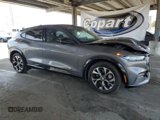 2023 Ford Mustang Mach-E Premium with VIN 3FMTK3SU2PMA97939, listed as a Copart auction lot 61383185 with 53,236 mi miles and Salvage title. Bid and sale history available at DreamBid. Image 4.