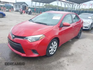 2015 Toyota Corolla L with VIN 2T1BURHEXFC310169, listed as a IAAI auction lot 42009753 with 163,385 mi miles and . Bid and sale history available at DreamBid. Image 2.