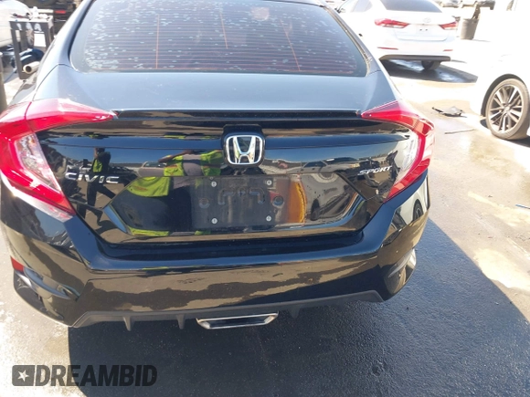2021 Honda Civic Sport with VIN 2HGFC2F81MH529499, listed as a IAAI auction lot 41836215 with 55,833 mi miles and . Bid and sale history available at DreamBid. Image 16.