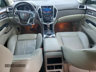 2014 Cadillac SRX Luxury Collection z VIN 3GYFNBE39ES567196, wystawiony jako Copart lot #55326075 z przebiegiem 98 942 mil mil oraz Szkody całkowita. Historia ofert i sprzedaży dostępna na DreamBid. Obrazek 8.