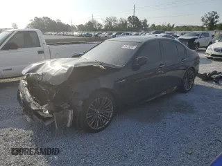 2014 BMW M5 z VIN WBSFV9C53ED594132, wystawiony jako Copart lot #56479355 z przebiegiem 89 020 mil mil oraz Szkody całkowita. Historia ofert i sprzedaży dostępna na DreamBid. Obrazek 1.