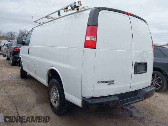 2015 Chevrolet Express Cargo Van with VIN 1GCWGFCFXF1259591, listed as a IAAI auction lot 42029679 with 144,023 mi miles. Bid and sale history available at carsss.com. Image 3.