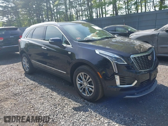 2021 Cadillac XT5 AWD Premium Luxury z VIN 1GYKNDRS8MZ217572, wystawiony jako IAAI lot #42190571 z przebiegiem 25 100 mil mil oraz . Historia ofert i sprzedaży dostępna na DreamBid. Obrazek 1.