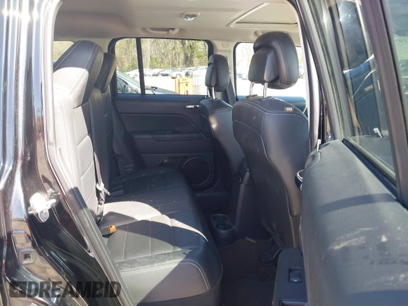 2014 Jeep Patriot Latitude with VIN 1C4NJPFA6ED928021, listed as a IAAI auction lot 41973268 with 73,456 mi miles and . Bid and sale history available at carsss.com. Image 8.