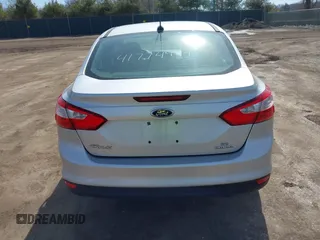 2014 Ford Focus SE with VIN 1FADP3F20EL427620, listed as a IAAI auction lot 41774994 with 60,080 mi miles and . Bid and sale history available at DreamBid. Image 16.