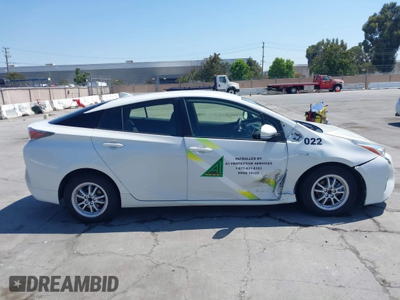 2017 Toyota Prius Two with VIN JTDKBRFU8H3034280, listed as a IAAI auction lot 42645785 with 127,553 mi miles and . Bid and sale history available at DreamBid. Image 13.
