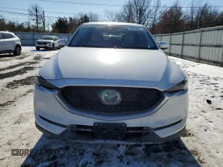 2021 Mazda CX-5 Grand Touring with VIN JM3KFBDM3M1305807, listed as a Copart auction lot 42713655 with 58,162 mi miles and Salvage Title. Bid and sale history available at DreamBid. Image 5.