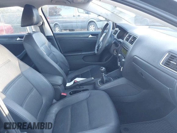 2012 Volkswagen Jetta SE with VIN 3VWBP7AJ3CM338852, listed as a IAAI auction lot 41011223 with 307,098 mi miles and . Bid and sale history available at DreamBid. Image 5.