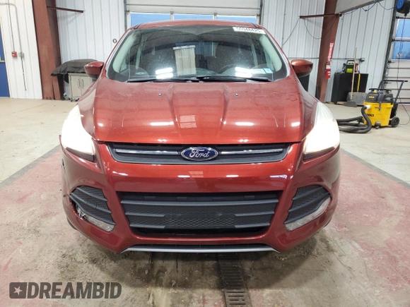 2015 Ford Escape SE with VIN 1FMCU0GX8FUB26785, listed as a Copart auction lot 50948425 with 73,177 mi miles and Salvage Title. Bid and sale history available at DreamBid. Image 5.