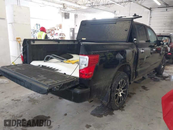 2021 Nissan Titan Pro-4X with VIN 1N6AA1ED6MN517649, listed as a IAAI auction lot 41731345 with 71,855 mi miles and . Bid and sale history available at DreamBid. Image 4.