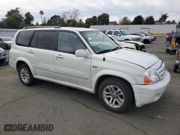 2004 Suzuki XL7 LX with VIN JS3TY92V844108854, listed as a Copart auction lot 49650735 with 201,373 mi miles and Salvage Title. Bid and sale history available at DreamBid. Image 4.
