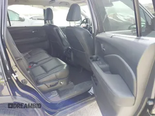 2020 Honda Pilot Touring 8-Passenger with VIN 5FNYF6H91LB003552, listed as a IAAI auction lot 41743685 with 76,725 mi miles and . Bid and sale history available at DreamBid. Image 8.