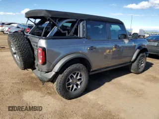 2023 Ford Bronco with VIN 1FMEE5DP0PLC10002, listed as a Copart auction lot 57272555 with 14,035 mi miles and Salvage title. Bid and sale history available at DreamBid. Image 3.