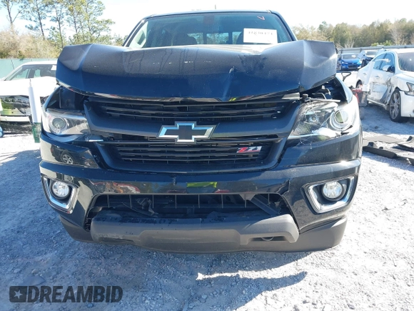 2016 Chevrolet Colorado 2WD Z71 z VIN 1GCGSDE39G1253003, wystawiony jako IAAI lot #41830474 z przebiegiem 74 000 mil mil oraz . Historia ofert i sprzedaży dostępna na DreamBid. Obrazek 6.