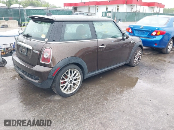 2010 MINI Hardtop S with VIN WMWMF7C50ATZ74395, listed as a IAAI auction lot 42227483 with 109,704 mi miles and . Bid and sale history available at DreamBid. Image 4.