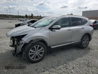2020 Honda CR-V Touring z VIN 7FARW1H90LE001447, wystawiony jako Copart lot #50841955 z przebiegiem 83 199 mil mil oraz Szkoda całkowita • Salvage title. Historia ofert i sprzedaży dostępna na DreamBid. Obrazek 1.