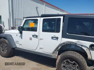 2014 Jeep Wrangler Unlimited Sport with VIN 1C4BJWDG1EL121190, listed as a IAAI auction lot 41913348 with 162,066 mi miles and . Bid and sale history available at DreamBid. Image 14.