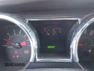 2005 Ford Mustang Deluxe z VIN 1ZVFT80N955155293, wystawiony jako IAAI lot #41891807 z przebiegiem 169 092 mil mil oraz . Historia ofert i sprzedaży dostępna na DreamBid. Obrazek 7.