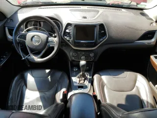 2014 Jeep Cherokee Trailhawk с VIN 1C4PJMBS8EW268056, выставлен на аукционе Copart как лот 54951885 с пробегом 111 678 миль миль и Списание • Salvage title. История ставок и продаж доступна на DreamBid. Изображение 8.