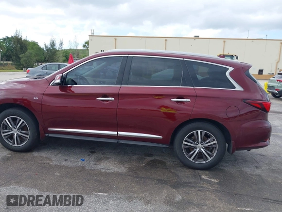 2019 Infiniti QX60 LUXE with VIN 5N1DL0MN3KC502044, listed as a IAAI auction lot 42130349 with 276,156 mi miles. Bid and sale history available at carsss.com. Image 14.