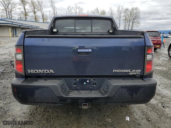 2013 Honda Ridgeline RT with VIN 5FPYK1F23DB002979, listed as a Copart auction lot 52128235 with 70,125 mi miles and Salvage Title. Bid and sale history available at carsss.com. Image 6.