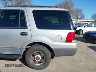 2004 Ford Expedition XLS with VIN 1FMRU13W64LB51765, listed as a IAAI auction lot 41760670 with 84,333 mi miles. Bid and sale history available at carsss.com. Image 19.