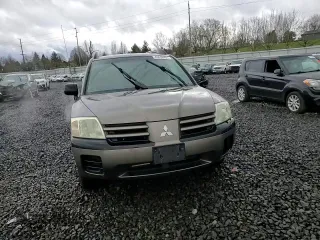 2004 Mitsubishi Endeavor LS with VIN 4A4MN21S74E013411, listed as a Copart auction lot 43638495 with 265,778 mi miles and Salvage Title. Bid and sale history available at carsss.com. Image 11.