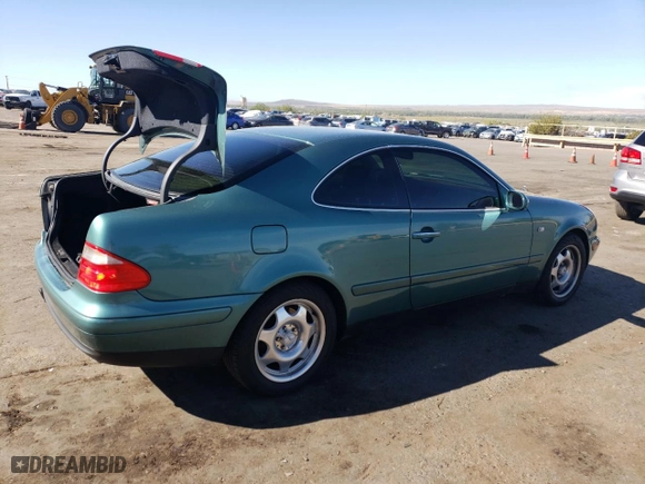 1999 Mercedes-Benz CLK-Class with VIN WDBLJ65G4XF071095, listed as a Copart auction lot 72080064 with 97,558 mi miles and Salvage Title. Bid and sale history available at carsss.com. Image 3.