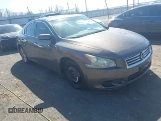 2013 Nissan Maxima SV with VIN 1N4AA5AP0DC808692, listed as a IAAI auction lot 41748284 with 123,479 mi miles and . Bid and sale history available at DreamBid. Image 1.