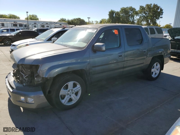2011 Honda Ridgeline RTL with VIN 5FPYK1F58BB452957, listed as a Copart auction lot 63214204 with 223,311 mi miles and Salvage Title. Bid and sale history available at carsss.com. Image 1.